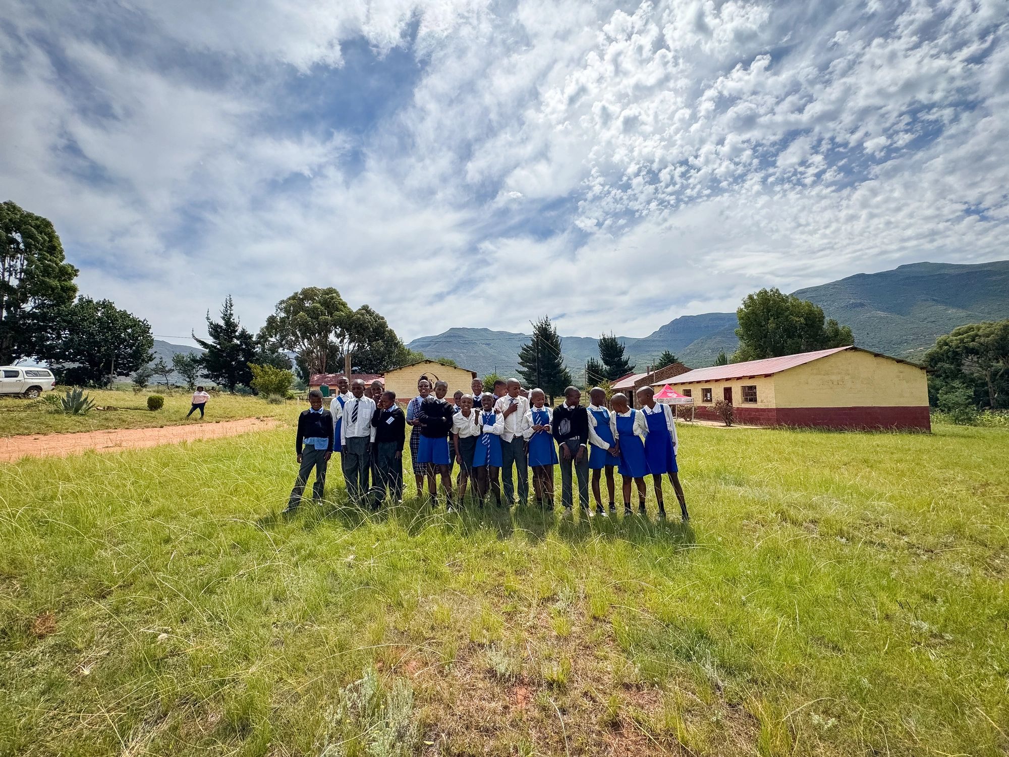 School children standing outside a rural school in Lesotho